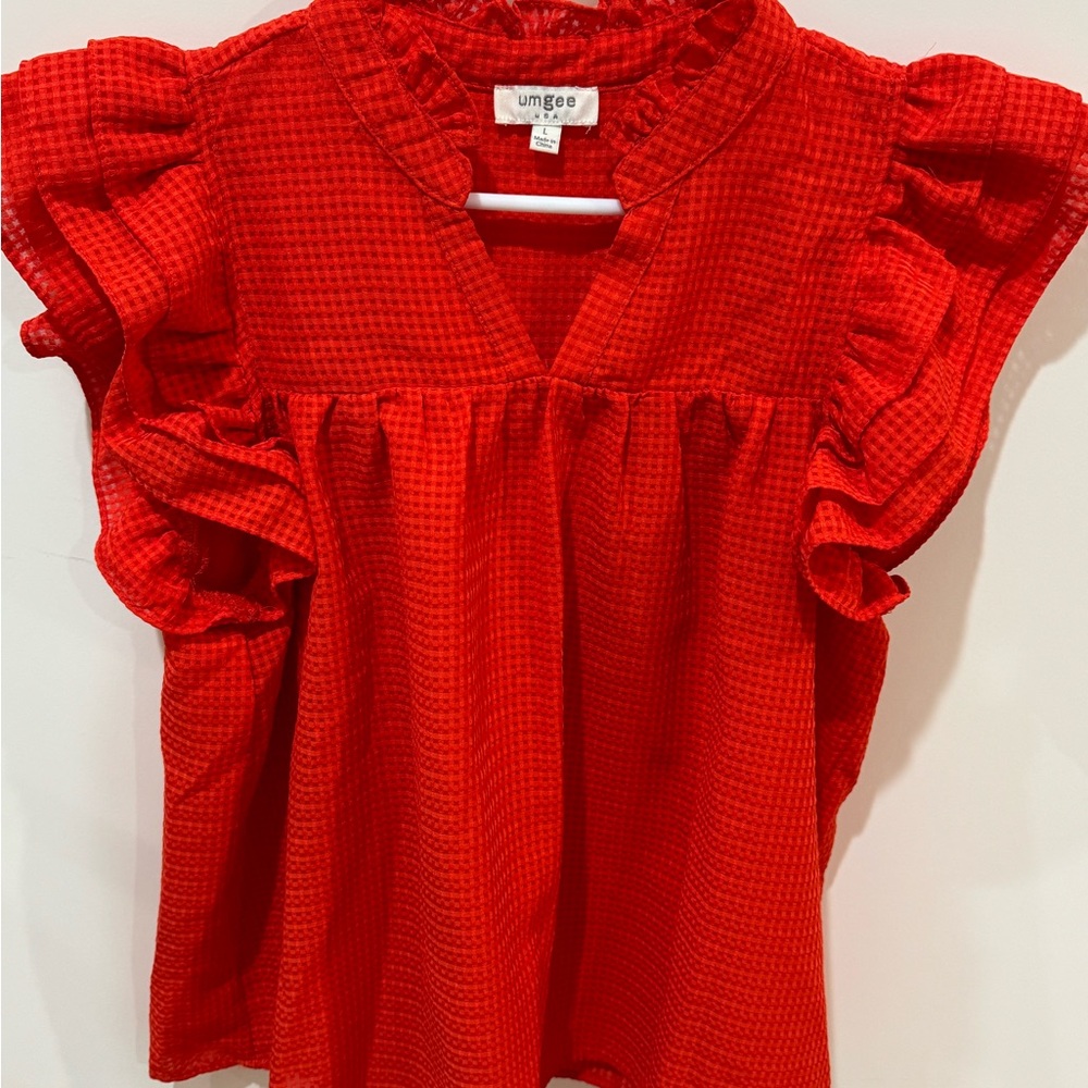 Red ruffle shirt. Never worn